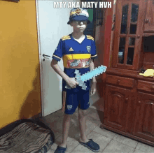 a young boy wearing a bucket hat and holding a minecraft sword in a living room .