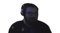 a man with a beard wearing headphones and a shirt that says xbox