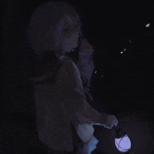 a girl in a school uniform is holding a lantern in her hand