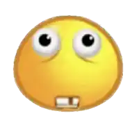 a close up of a smiley face with big eyes and teeth .