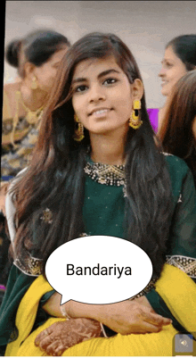 a woman in a green and yellow dress has a speech bubble that says bandariya