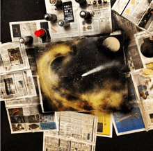 a painting of a galaxy is surrounded by newspapers including one that says what the ny