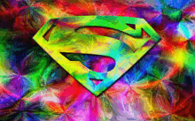 a colorful background with a superman logo in the center