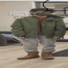 a pixelated image of a person wearing a green jacket