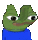 a green frog with two faces is wearing a blue shirt and has two eyes .