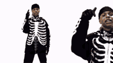 a man in a skeleton costume is pointing his finger