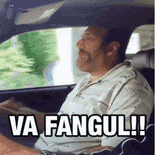 a man driving a car with the words va fangul