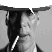 a man in a cowboy hat is smoking a cigarette .