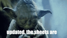 a close up of yoda with the words updated , the sheets are written below him