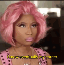 a woman with pink hair and a necklace says i know eventually my career