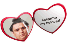 a heart shaped mirror with the words aoyama my beloved on it