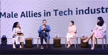 a group of people sitting in front of a screen that says " male allies in tech industry "