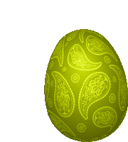 a green easter egg with a paisley design on it