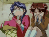 two anime girls sitting next to each other with one covering her mouth