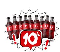 a group of coca cola bottles with the word despegado written on them