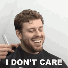 a man getting his hair cut with the words " i don 't care " on the bottom