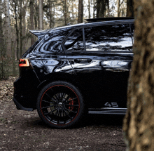 a black car with the number 45 on the side of it