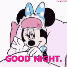 minnie mouse is wearing a sleep mask and saying good night