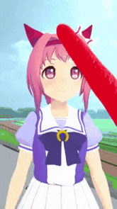 a girl with pink hair has a red stick on her head