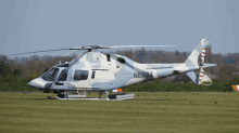 a helicopter with the number n155x on the side of it