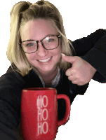 a woman holds a red mug that says ho ho ho on it