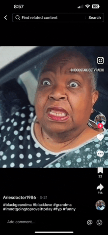 a woman is making a funny face while driving a car