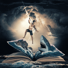 a man is holding a lightning bolt while a shark is coming out of an open book