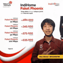 a young man stands in front of an ad for indihome