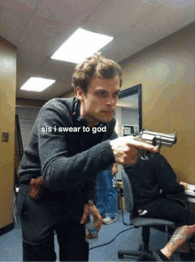 a man holding a gun with the words " sis i swear to god " below him