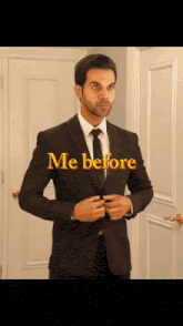 a man in a suit and tie is standing in front of a door with the words me before written on it