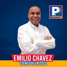 a man with his arms crossed stands in front of a poster that says emilio chavez cieneguilla 2022