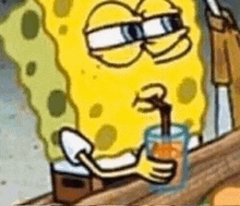 spongebob is drinking a drink through a straw .