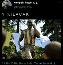 a statue of a soccer player is being displayed on a twitter for android page