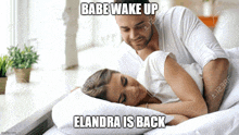 a man is laying next to a woman who is sleeping and the caption says babe wake up elandra is back