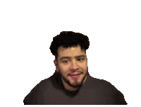 a man with a beard looks at the camera with a white background behind him