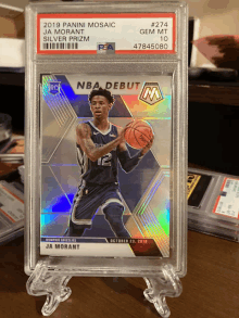 a 2019 panini mosaic ja morant basketball card is on display