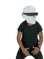 a man wearing a skull mask and sunglasses is kneeling down