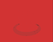 a red background with a black symbol in the shape of a swirl