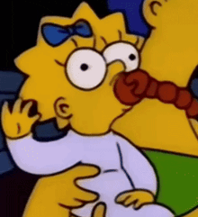 maggie simpson is a cartoon character from the simpsons and is holding a red object in her mouth .