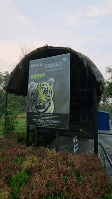 a sign that says " will you be parent " with a tiger on it