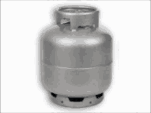 a stainless steel gas cylinder is sitting on a white surface .