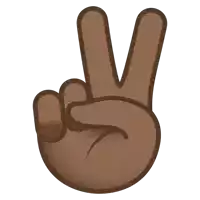 a brown hand is making a peace sign with two fingers