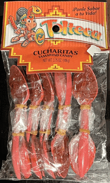 a package of cucharitas tamarind candy with red plastic spoons in it