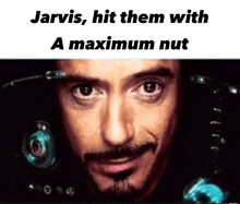 a close up of a man 's face with the words jarvis hit them with a maximum nut