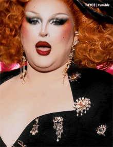 a close up of a drag queen 's face with t4yce tumblr written below her