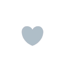 a small gray heart is sitting on a white background .