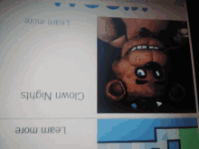 a computer screen shows a picture of a teddy bear with the words learn more below it