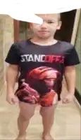 a boy wearing a shirt that says standoff 2 on it