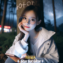 a girl wearing glasses is leaning against a tree with the words museum bola situs slot gacor on the bottom