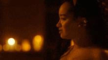 a woman in a dark room with the words what 's changed on the bottom